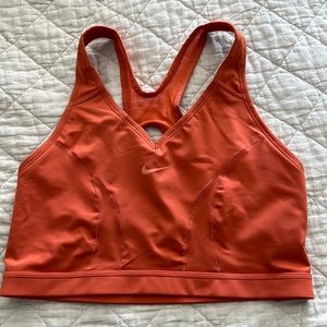 NWOT never worn - Nike burnt orange size L sports bra